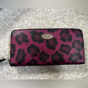 Authentic Coach Zippered Wallet.  Purple/Pink Cheetah print.